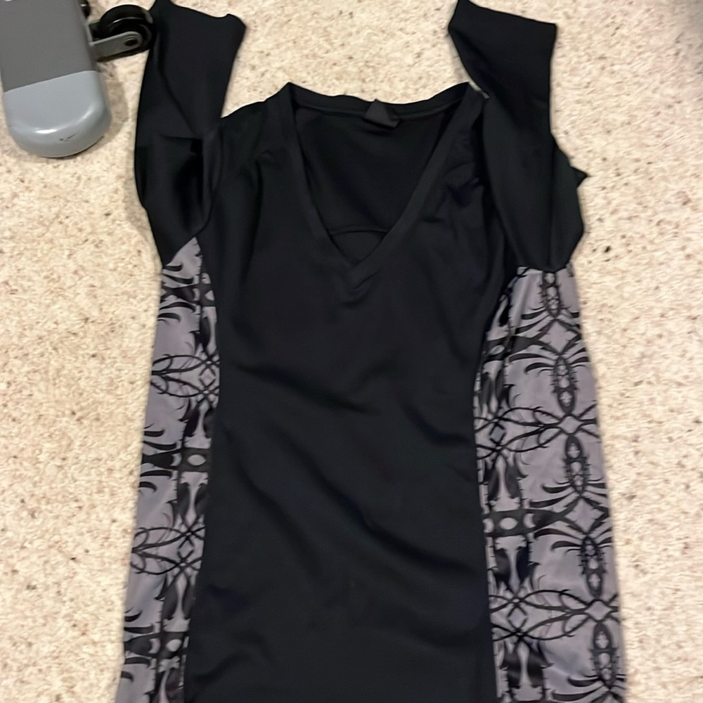 Women’s black and grey v necked shirt